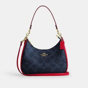 Teri Hobo Bag In Signature Canvas